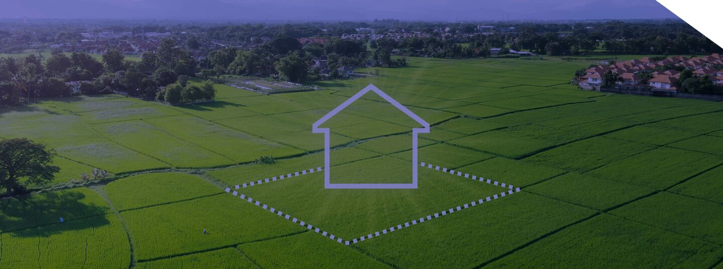 Champ vert avec une icone de maison